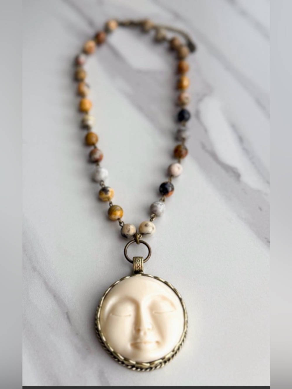 Dylan Jewelry Handcrafted Cream Moon Face Pendant Necklace with Earth-Tone Beads